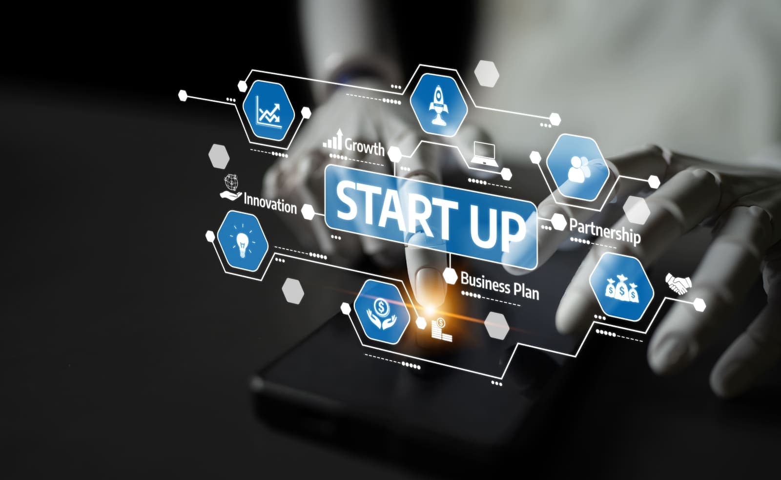 A startup founder reviewing their website strategy - the first website is a hypothesis, not a final product.