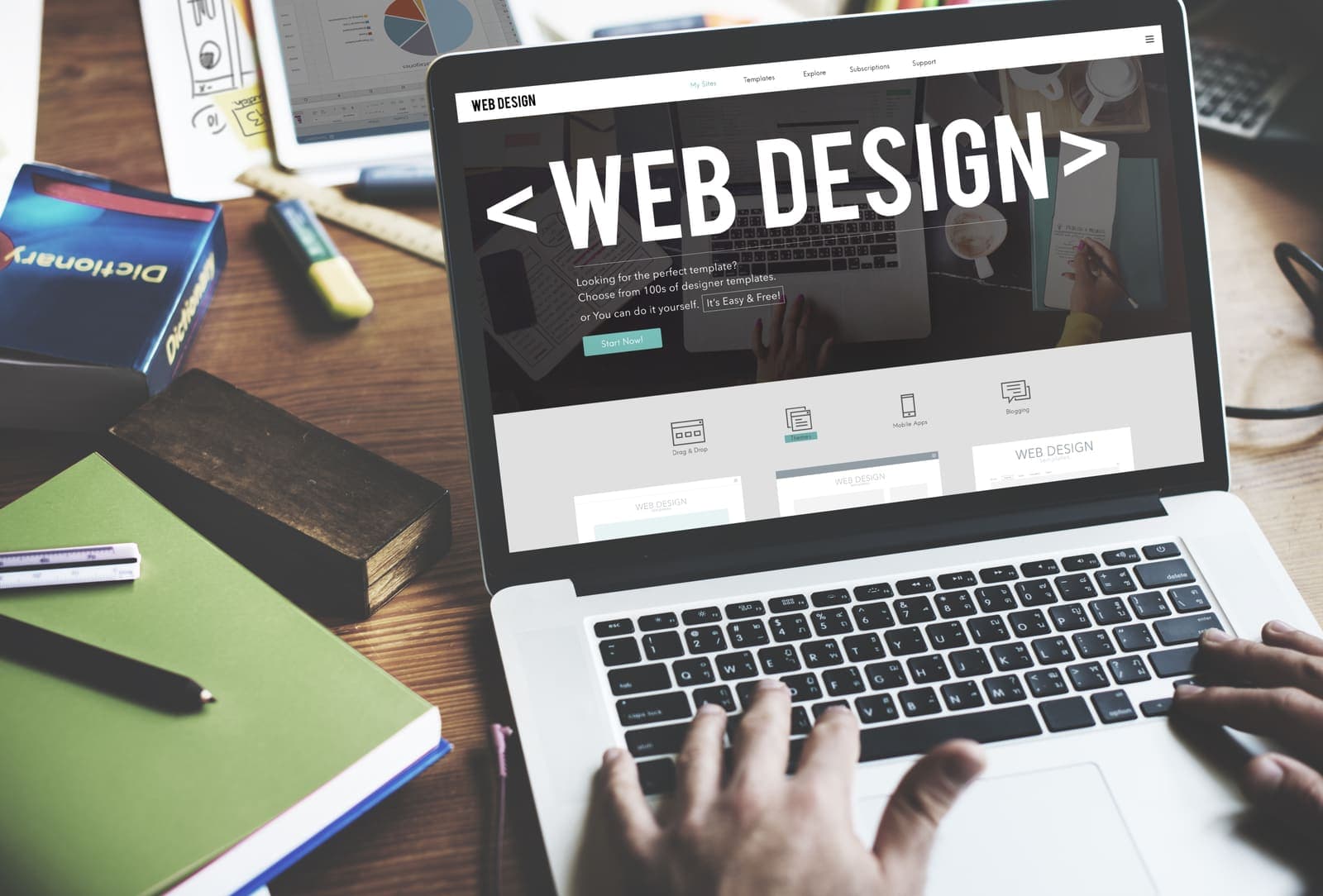 Laptop screen showing a web design landing page - the kind of polished hero an animated website design company should be able to design before coding.